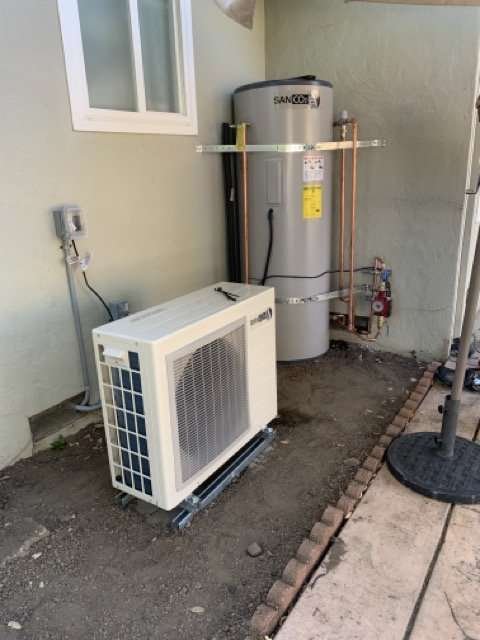 CO2 heat-pump water heater system with outdoor compressor unit