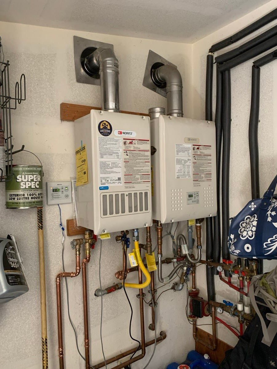 Dual boilers with circulator pump and hydronic piping for radiant heating