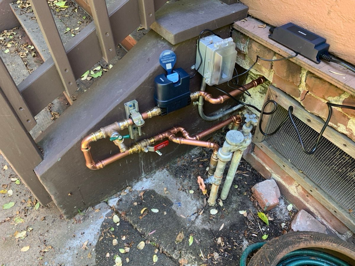 New copper water supply piping with water meter and shut-off valves