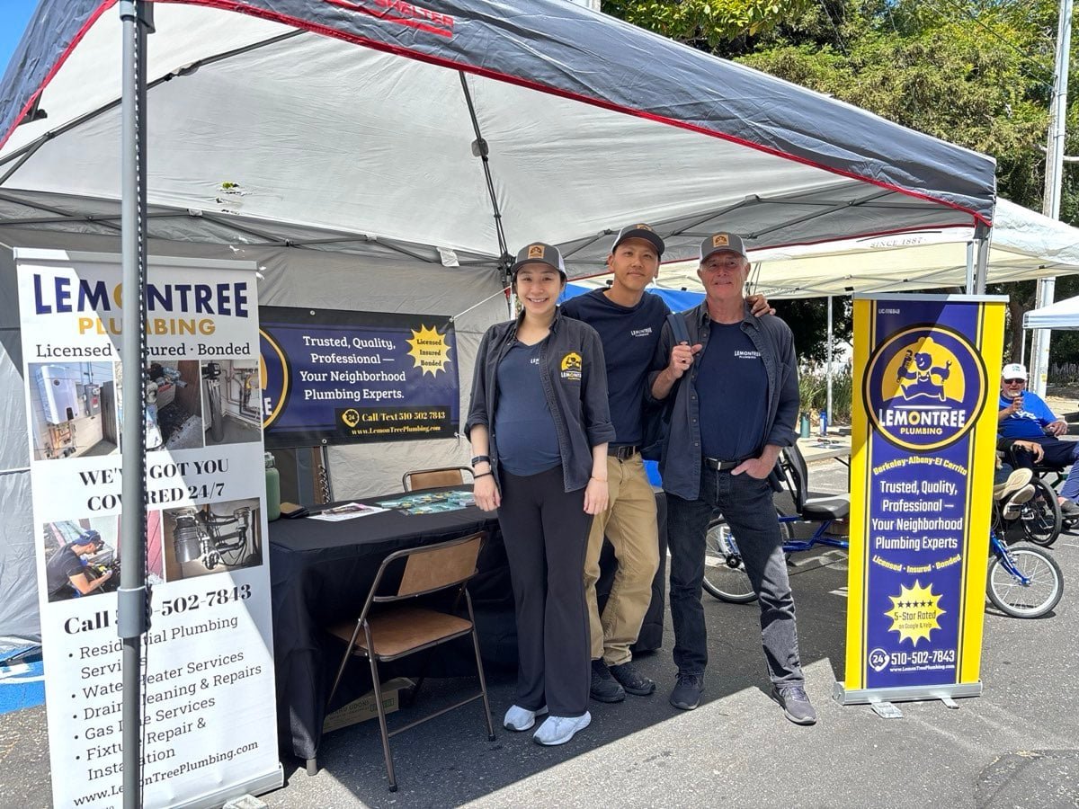 LemonTree Plumbing team at a community event booth