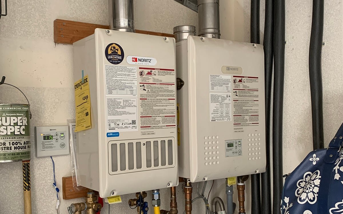 Tank water heater installed with seismic straps